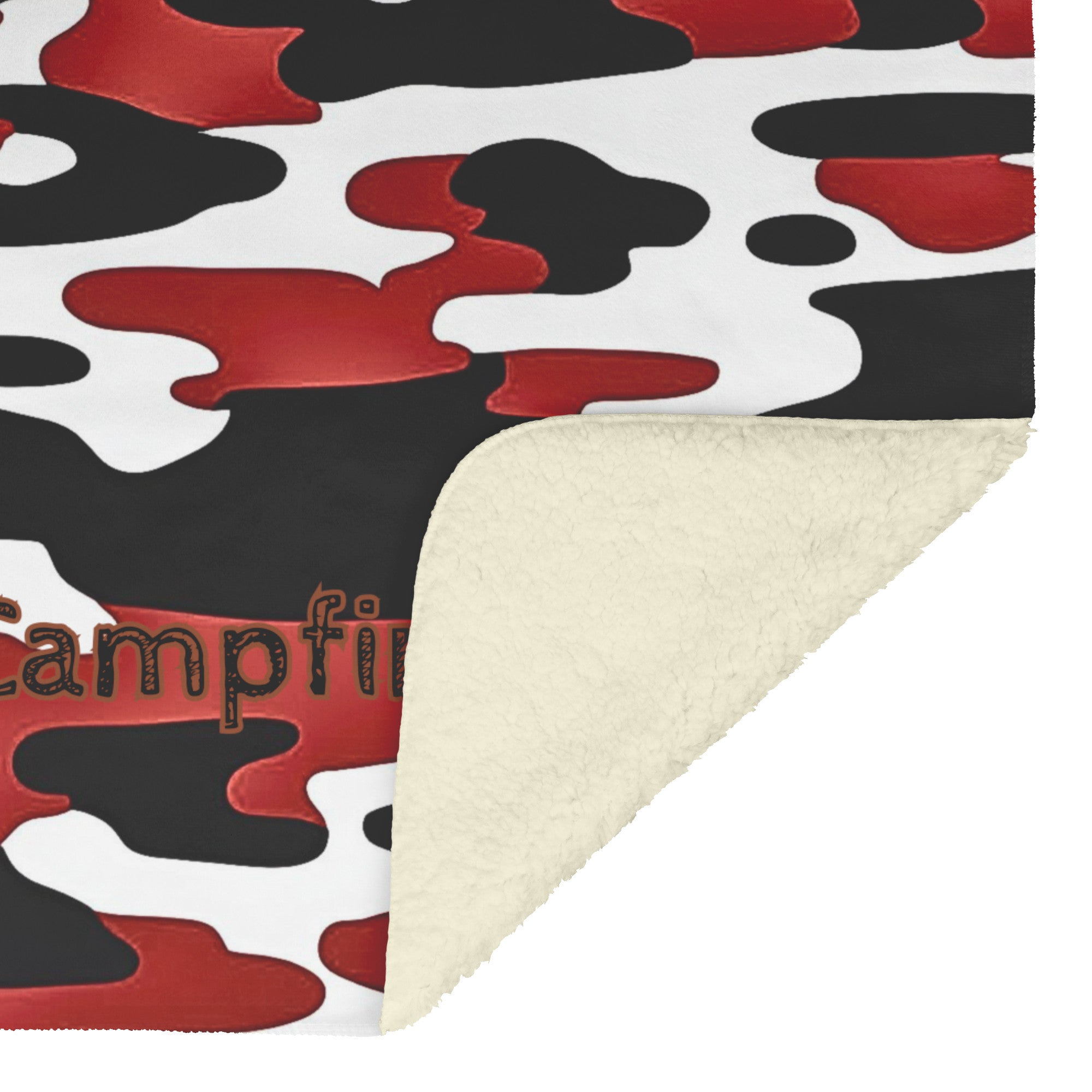Cozy black, red and white camo sherpa fleece blanket – semi-weighted for extra comfort and anxiety relief, perfect for cold nights or snuggling in. With corner flipped up showing the fleece side.