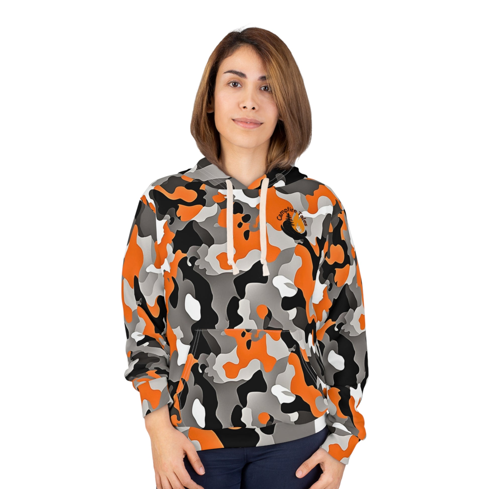 Woman in Unisex Orange Camo Storytelling Hoodie sparking Campfire Tales’ resilience and voice gig vibes