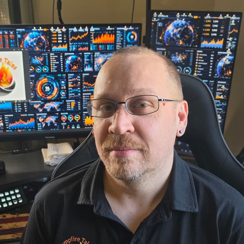 Camp, founder of Campfire Tales, at his desk